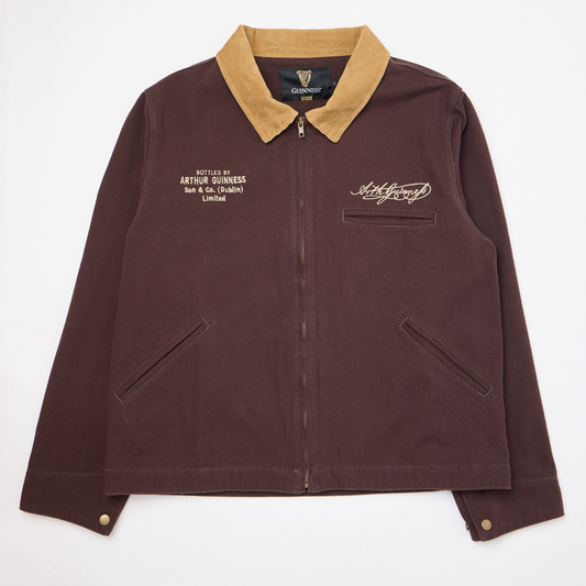Guinness Cooperage Work Jacket in brown with tan corduroy collar, front zipper, two slant pockets, and embroidered Guinness branding on the left chest.