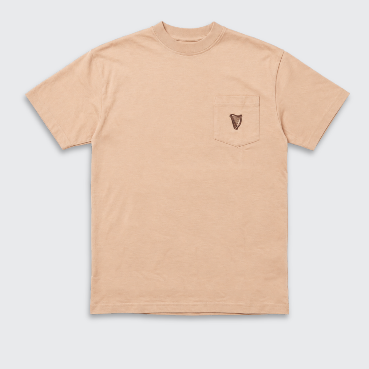 Guinness Cooperage Ivory Heavyweight Tee by Guinness Webstore US—beige short-sleeve tee with chest pocket and small dark emblem, shown on a plain white background.