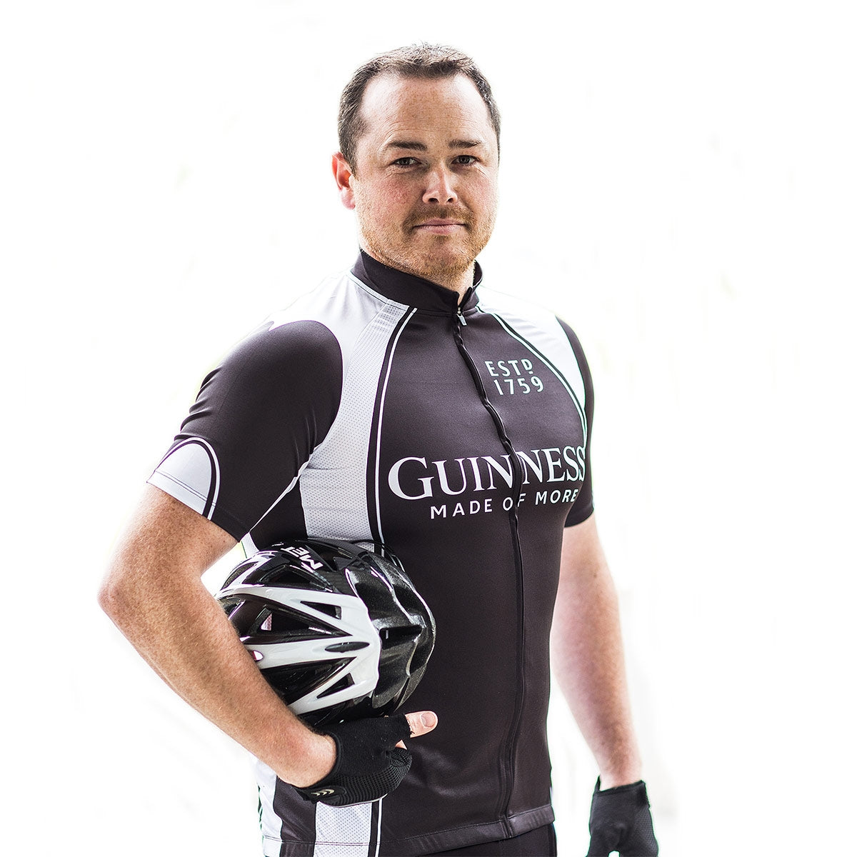 A man wearing a Guinness Basic Cycling Jersey.