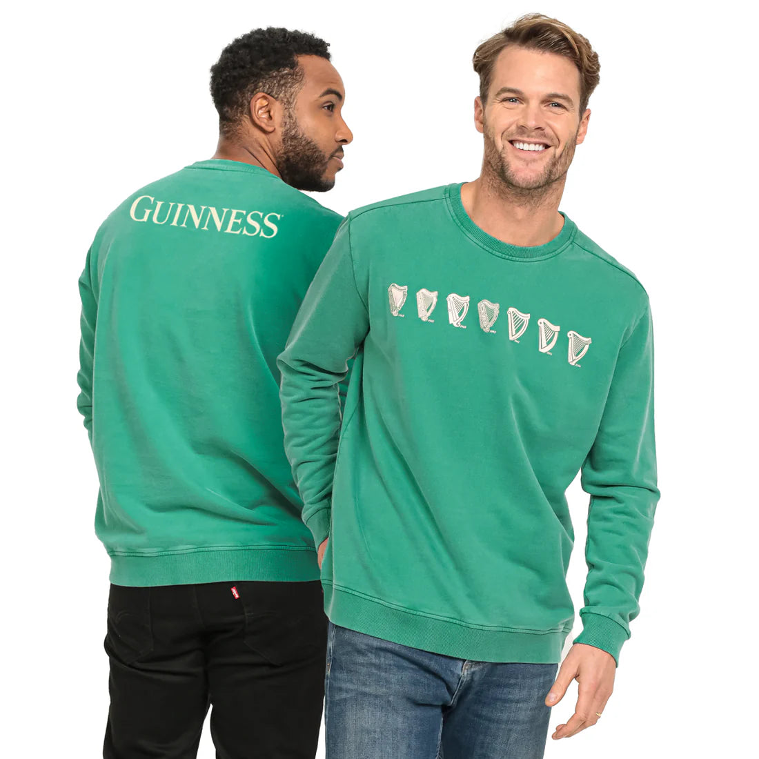 Two men don green cotton sweatshirts from the Guinness Webstore US; one displays the iconic "GUINNESS" logo with the trademark Harp on the back, while the other features seven pint glass icons across its front.