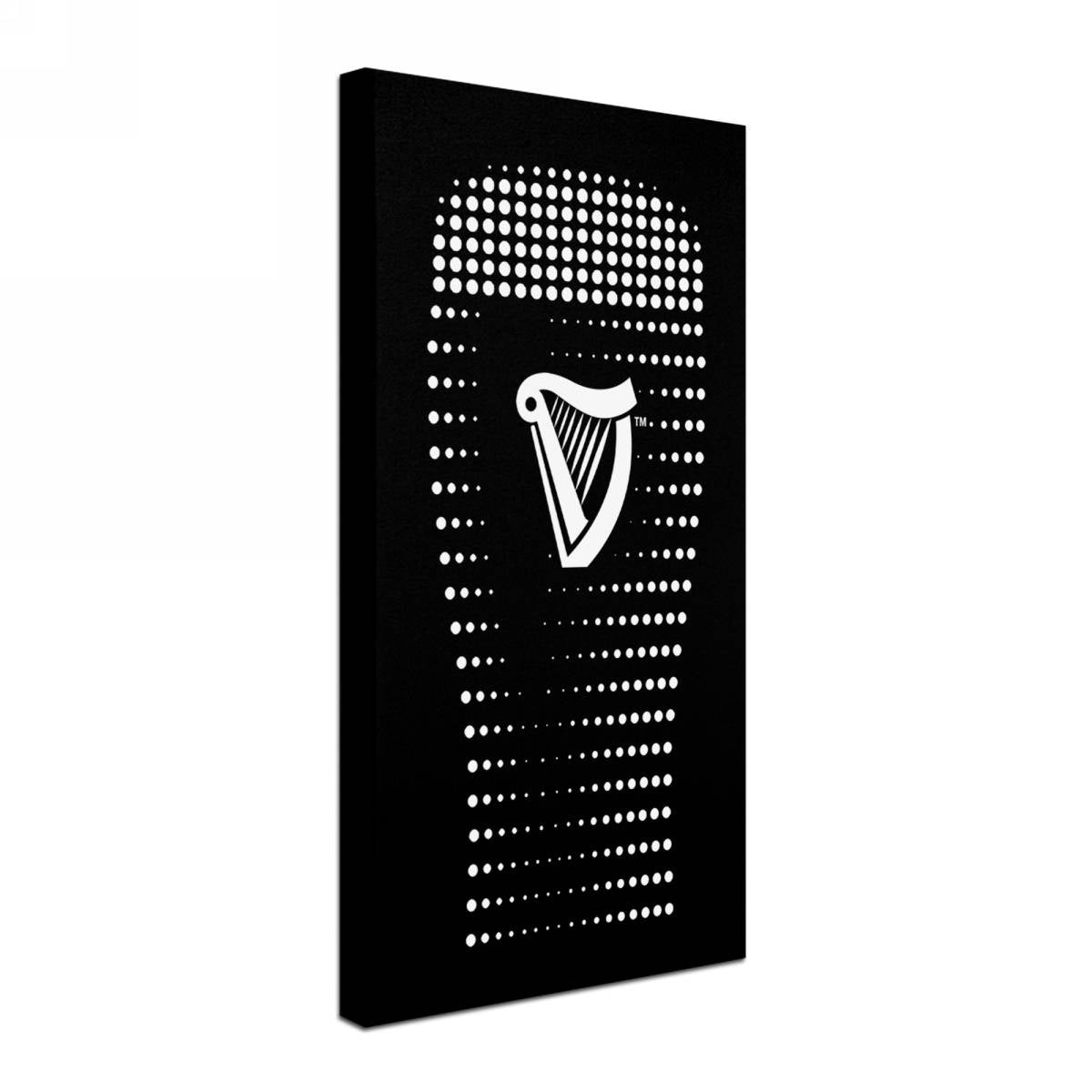 A Guinness-themed black canvas 'Guinness Brewery 'Guinness VIII' Canvas Art' with a harp on it.