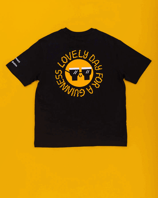 A Guinness summer t-shirt with sunglasses on it.