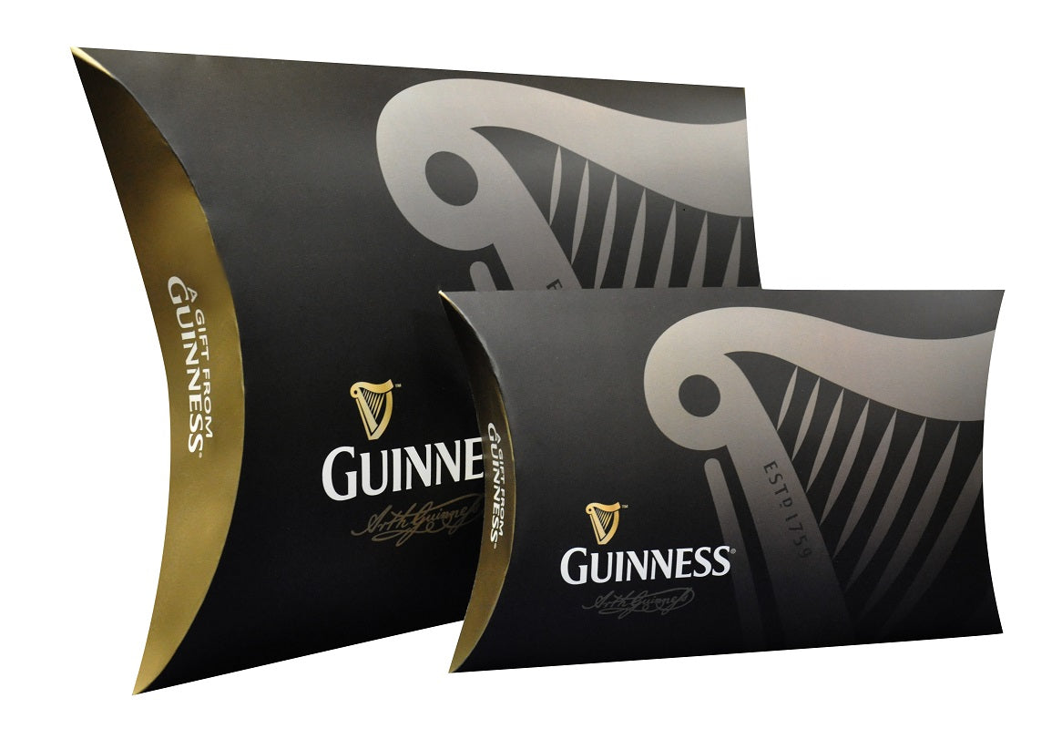 Two Guinness Pint Shaped Oven Glove boxes decorated with a recognizable harp emblem.