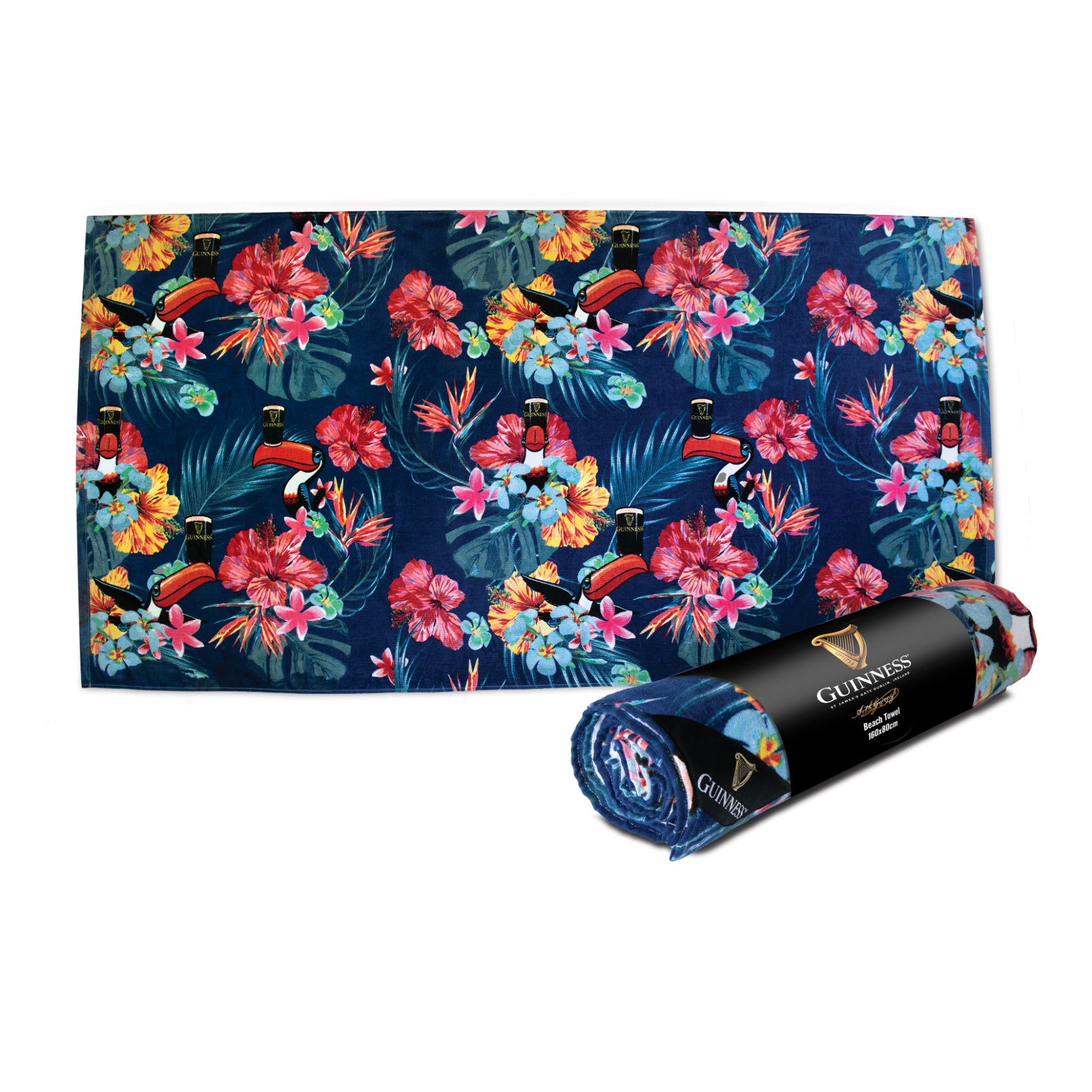 A rolled-up Guinness Toucan Hawaiian Beach Towel next to its unrolled version displaying a vibrant tropical print.