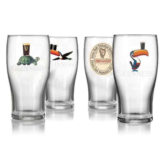 The Guinness Mixed Pint Glass Gift Set from Guinness Webstore US includes four collectible glasses featuring unique designs: a turtle with a pint, a flying toucan with a pint, a vintage label, and a standing toucan. Perfect for Irish beer lovers.
