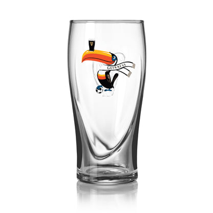 The Guinness Soccer Pint Glass – Special Edition from Guinness Webstore US showcases a toucan balancing a pint and a "Guinness" banner, making it perfect for celebrating the 2026 tournament.