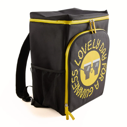 Add a pop of color to your outings with the Guinness x Fatti Burke Lovely Day Bundle Backpack from Guinness Webstore US—this black and yellow backpack features a front pocket adorned with a smiley face and the phrase "Lovely day for a Guinness" in a circular design, making it the perfect companion for your bundle, or pair it with your favorite beach towel and cooler bag for unforgettable fun days out.