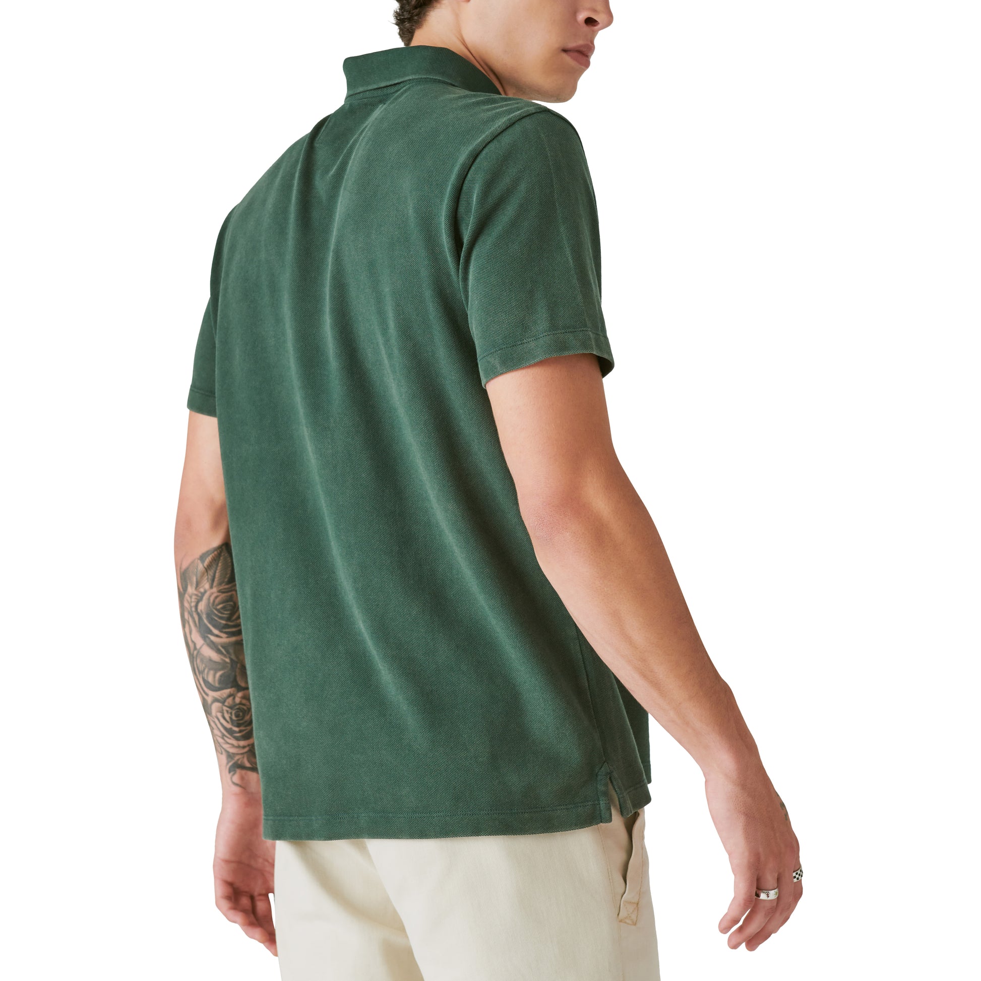 The back view of a man wearing a Guinness Polo - Pine Grove by Guinness Webstore US.