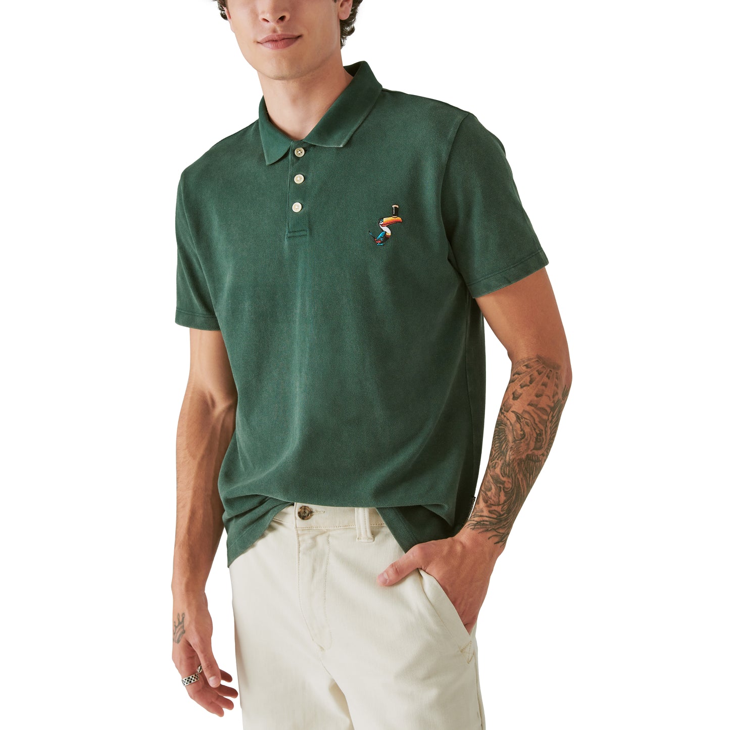 A man wearing a Guinness Polo - Pine Grove shirt from Guinness Webstore US.