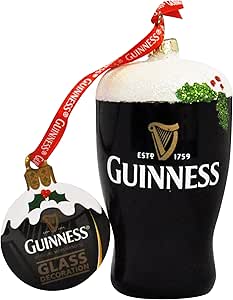 The Guinness Holiday Glass Decoration Pint perfectly encapsulates the festive spirit. It showcases a pint glass with foam and a round disc adorned with holly and the iconic Guinness logo. These charming ornaments are connected by a red ribbon, making them an enchanting addition to your holiday decor.