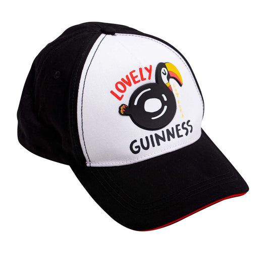 A Guinness summer-style baseball cap with Fatti Burke's "Lovely Day for a Guinness" Toucan design.