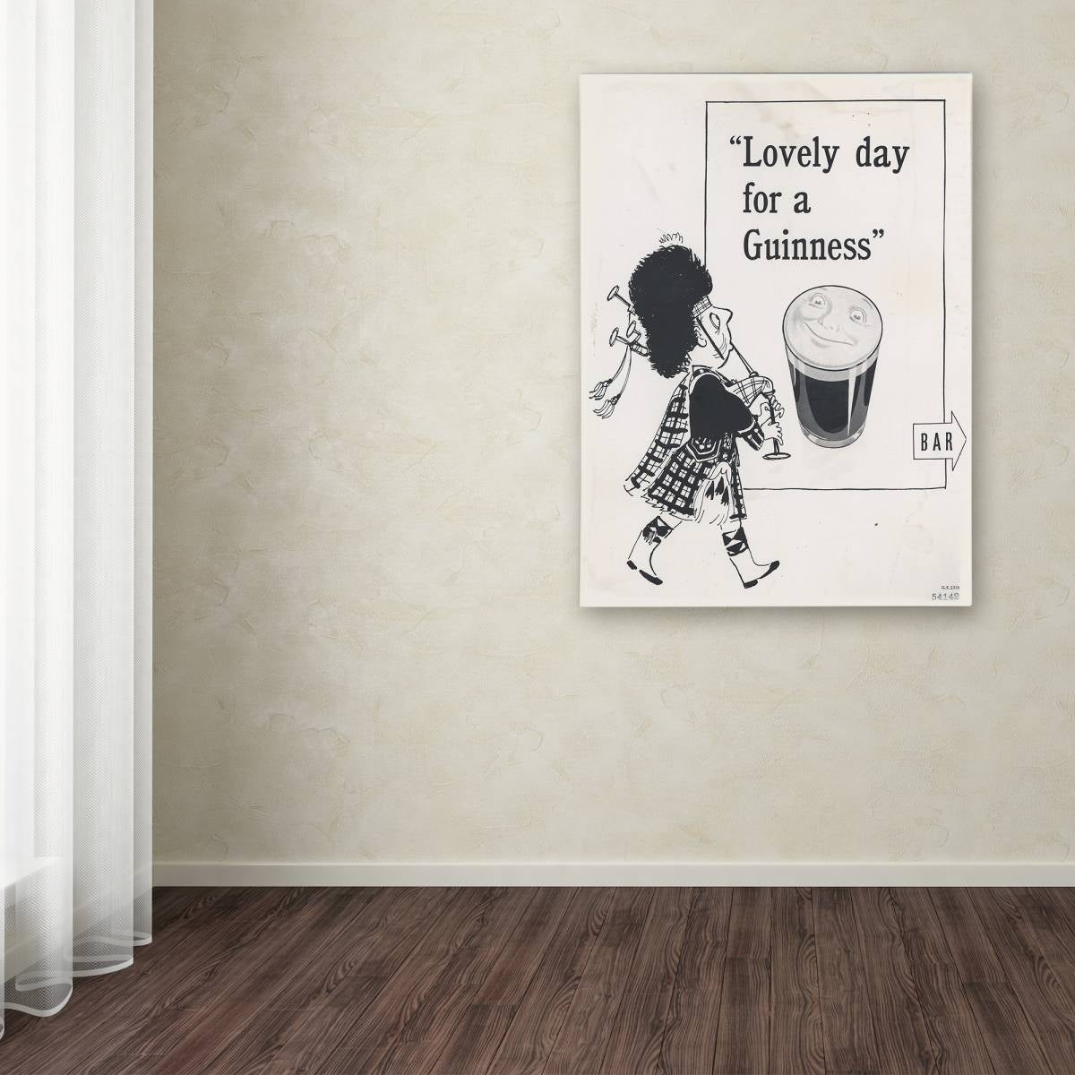 A Guinness 'Lovely Day For A Guinness IV' canvas art featuring the words 'lovely day'.