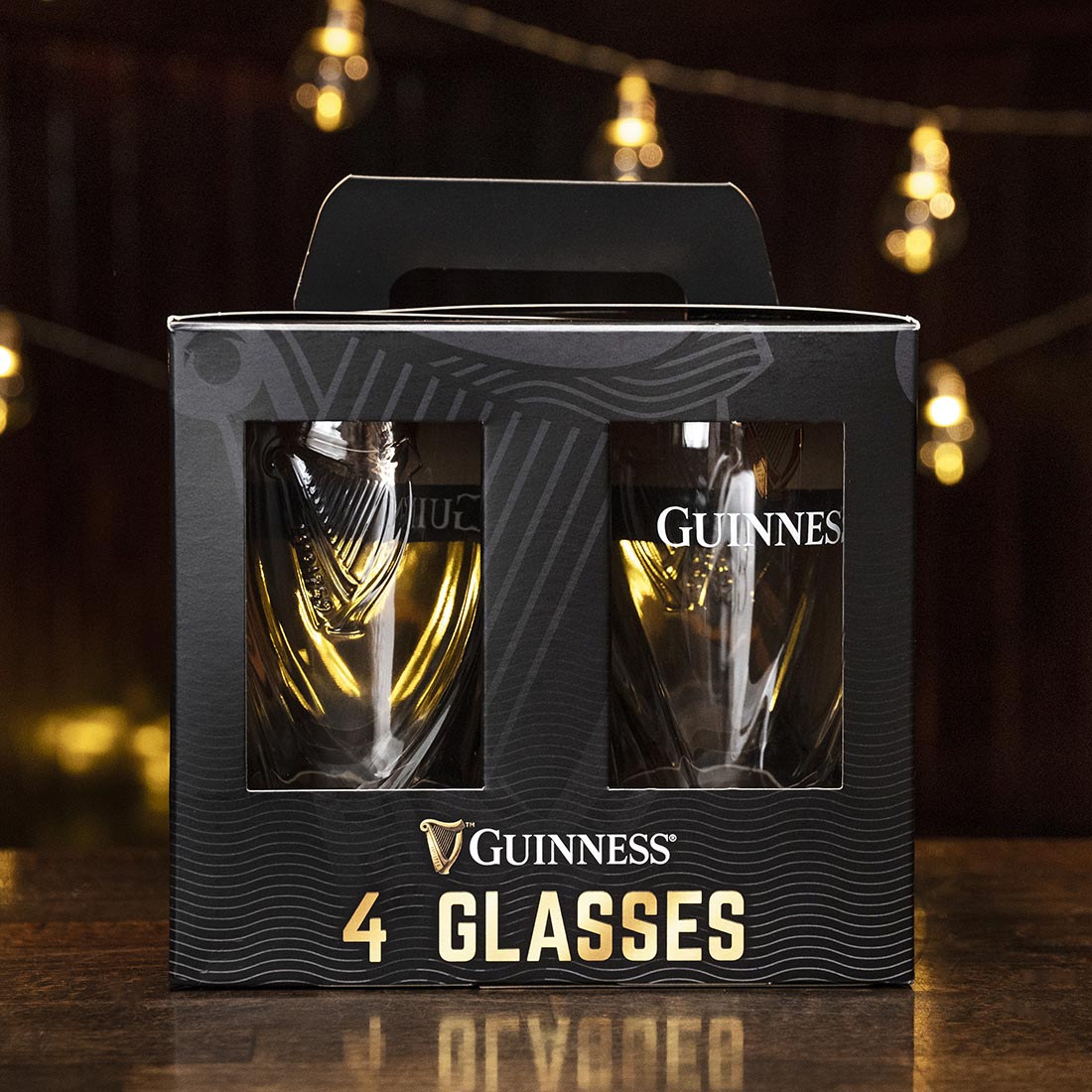 Four embossed Guinness Pint Glass 4 Pack in a box.