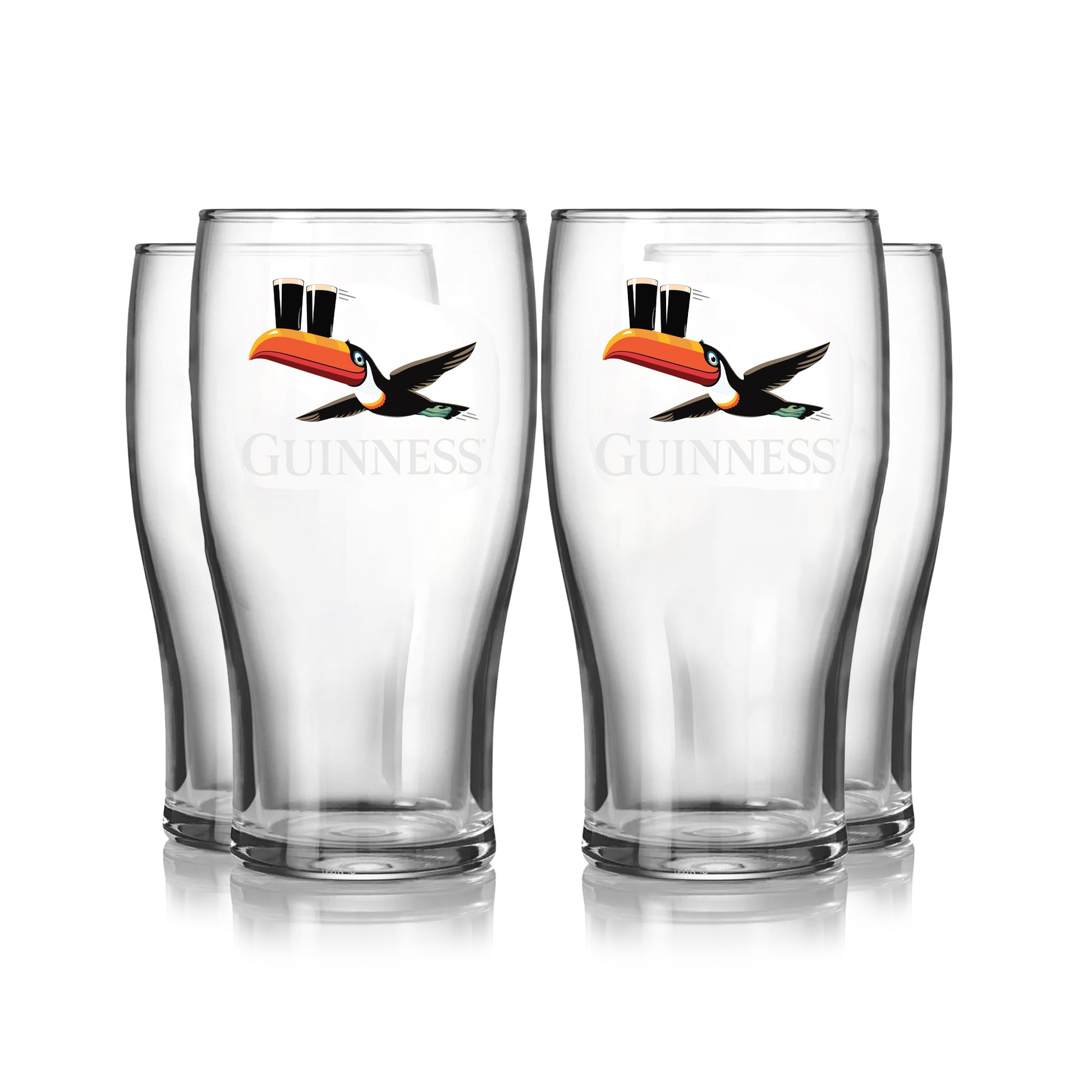 The Guinness Gilroy Flying Toucan Pint Glass - 4 Pack from Guinness Webstore US features four empty pint glasses with the iconic toucan balancing two pints, arranged in two rows on a white background—ideal for collectors and fans.
