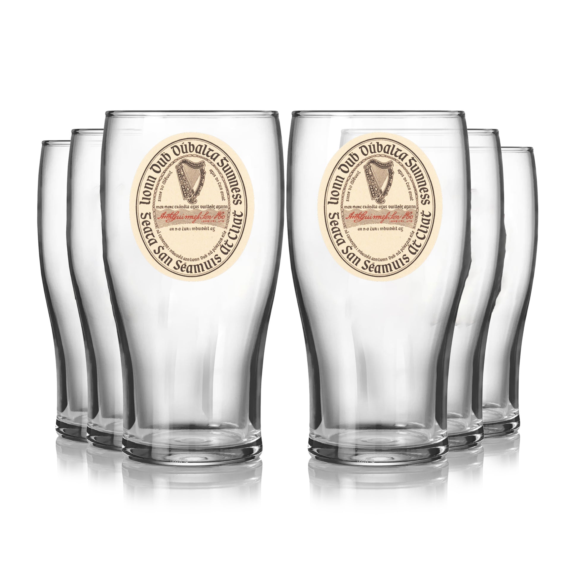 A set of six Guinness Vintage Label Pint Glasses from Guinness Webstore US, inspired by St. James’s Gate Dublin heritage, are arranged in two rows on a white background.