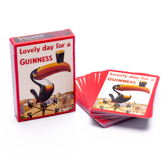 A deck of promotional Guinness Toucan playing cards featuring a toucan bird advertisement.