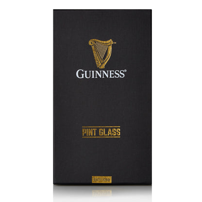 The Guinness Pint Glass Luxury Gift Box from Guinness Webstore US features a black rectangular box with a gold harp logo, "Guinness" text, and "Pint Glass" label—an ideal, stylish gift for any Guinness fan.