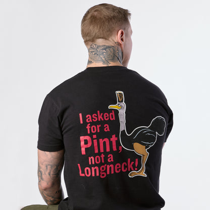 A person with neck tattoos is wearing the limited edition Guinness Gilroy Ostrich Tee – Black from Guinness Webstore US, featuring an ostrich graphic and the phrase, “I asked for a Pint, not a Longneck!”.