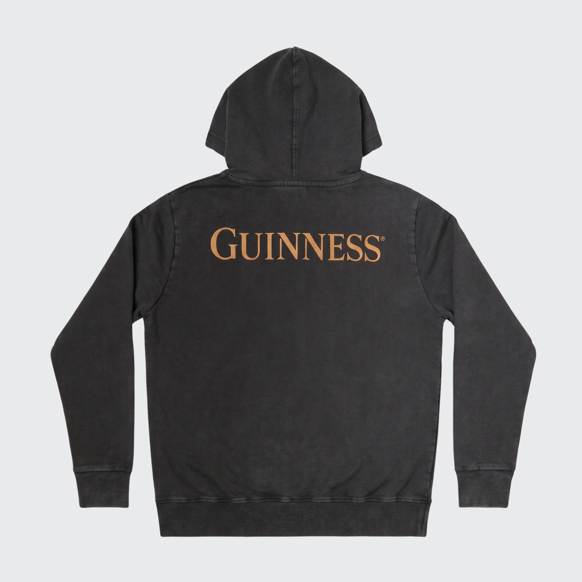 Black hooded sweatshirt with “GUINNESS” printed in large gold letters across the back, laid flat on a white background. The Guinness Evolution of the Harp Distressed Hoodie – Black from Guinness Webstore US features a comfortable distressed cotton design, perfect for any fan of the iconic brand.
