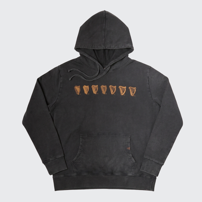 Introducing the Guinness Evolution of the Harp Distressed Hoodie – Black from Guinness Webstore US: this black hooded sweatshirt features a front pocket and six brown pint glass icons printed in a row across the chest, crafted from soft, distressed cotton for timeless comfort and style.