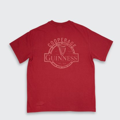 Introducing the Guinness Cooperage Burnt Red Heavyweight Tee from Guinness Webstore US—a burnt red t-shirt showcasing a “Cooperage Guinness” design and a harp logo, both subtly printed on the back in a lighter red shade. This heavyweight tee blends timeless style with an homage to authentic Guinness cooperage tradition.