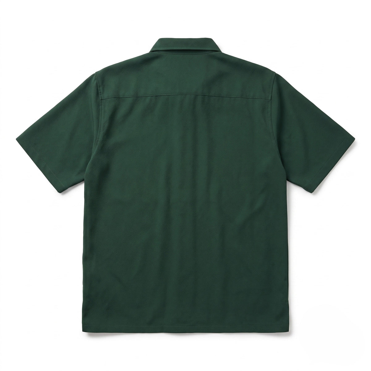 Guinness Cooperage Work Shirt in dark green, short sleeves and collar, shown from the back laid flat on a white background.
