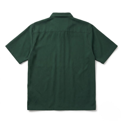 Guinness Cooperage Work Shirt in dark green, short sleeves and collar, shown from the back laid flat on a white background.