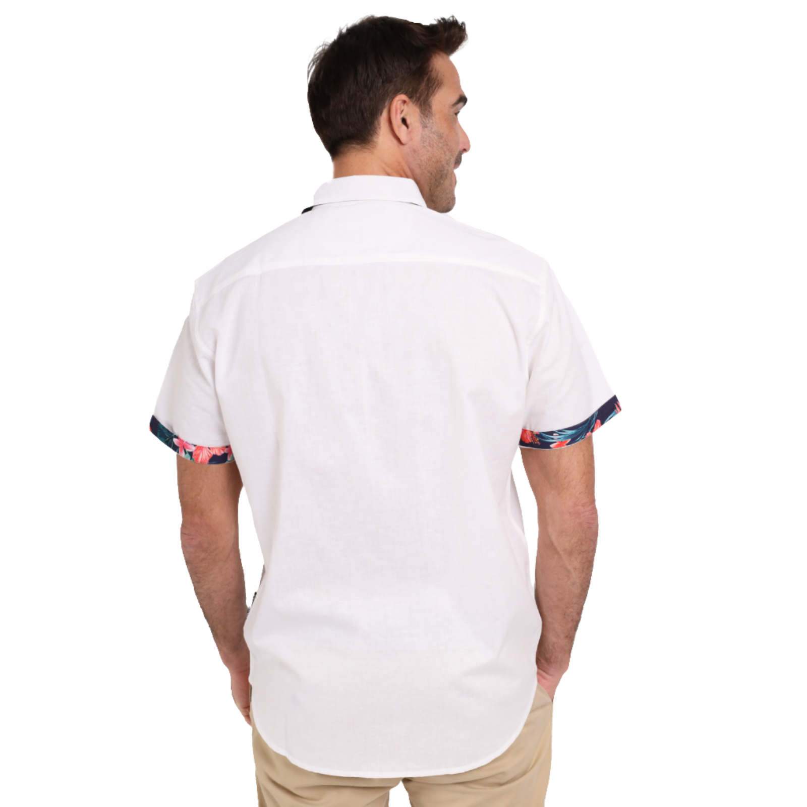 A man with short brown hair is seen from the back wearing a Guinness White Linen Summer Shirt from Guinness Webstore US, featuring vibrant floral cuffs and paired with beige pants.