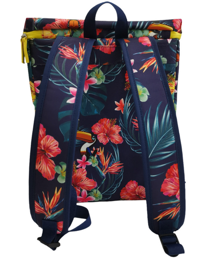 A Guinness Toucan Hawaiian Cooler Bag with vibrant tropical floral patterns in pink, red, and green shades, featuring blue straps and a yellow zipper. This 20-liter capacity bag from Guinness Webstore US is perfect for any adventure.