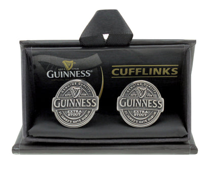 The Guinness Antique Label Cufflinks, featuring the classic Extra Stout logo, are presented upright in black packaging—an ideal Irish gift for fans of unique branded cufflinks.