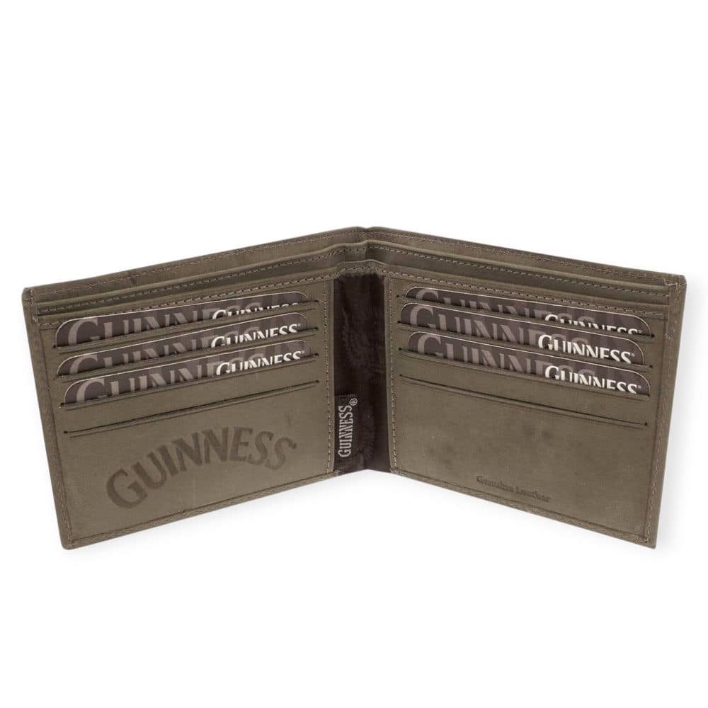 The Guinness Webstore US Classic Brown Leather Wallet is a bifold design embossed with "GUINNESS," featuring multiple card slots and cards displaying the Guinness logo.
