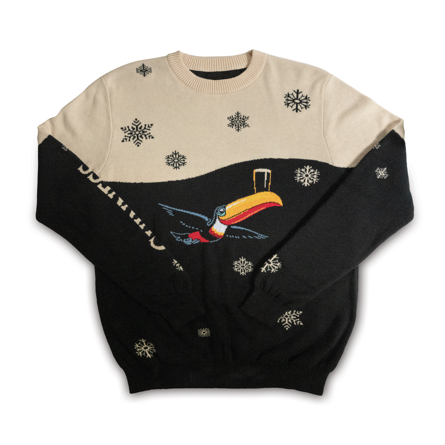 Guinness Holiday Black and Cream Toucan Sweater, from Guinness Webstore US, showcases a festive toucan and snowflake design, making it perfect for holiday parties with its beige and black sections.