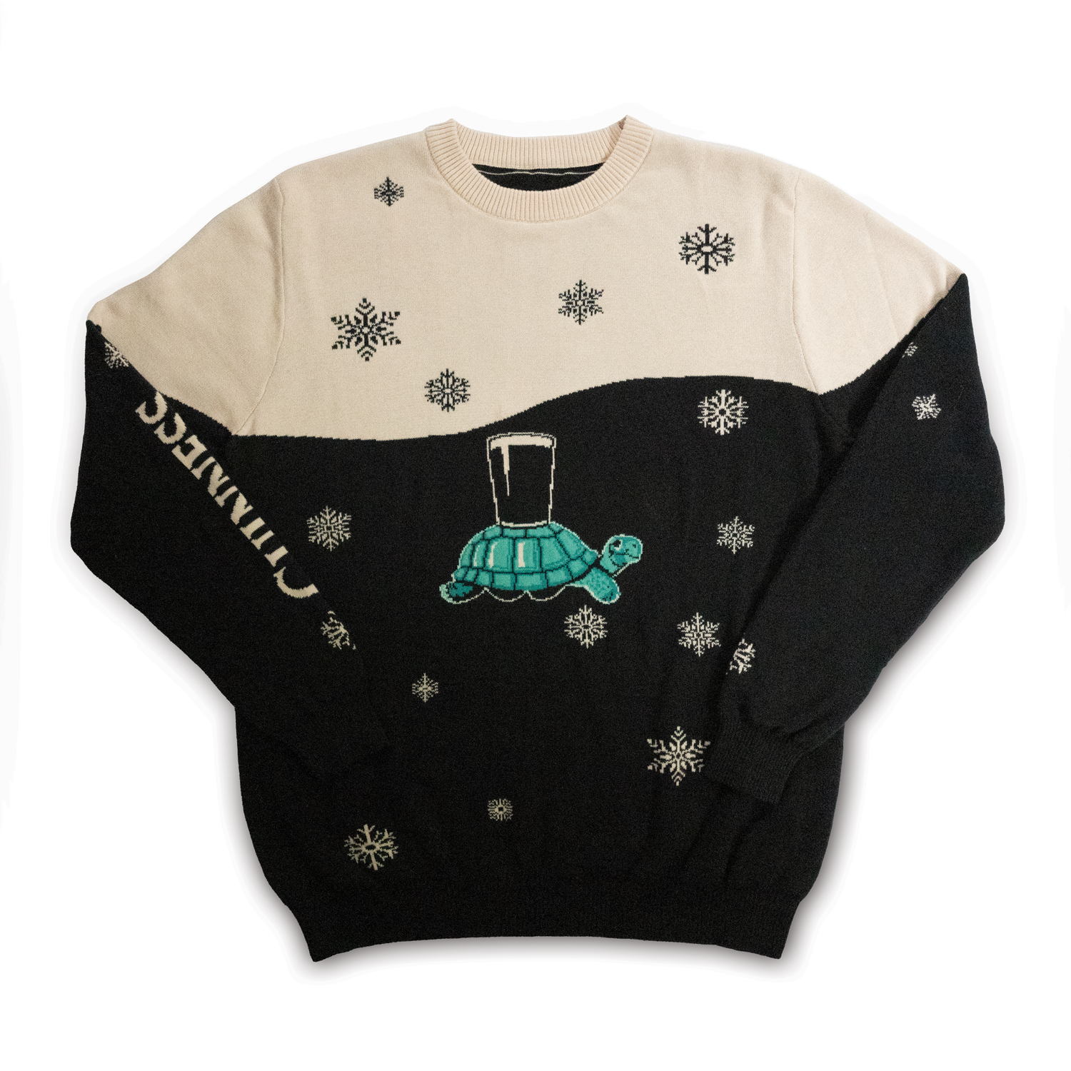 Guinness Holiday Black and Cream Tortoise Sweater adorned with a snowflake, tortoise, and pint glass design from the Guinness Webstore US.