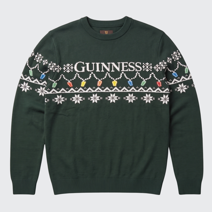 Ring in the holidays with the Guinness Holiday Pint Lights Sweater – Green from Guinness Webstore US, crafted from rich dark green fabric and adorned with classic “Guinness” lettering, crisp white snowflakes, and a cheerful row of colorful pint glass holiday lights along the chest and sleeves. The perfect choice for any festive gathering!.