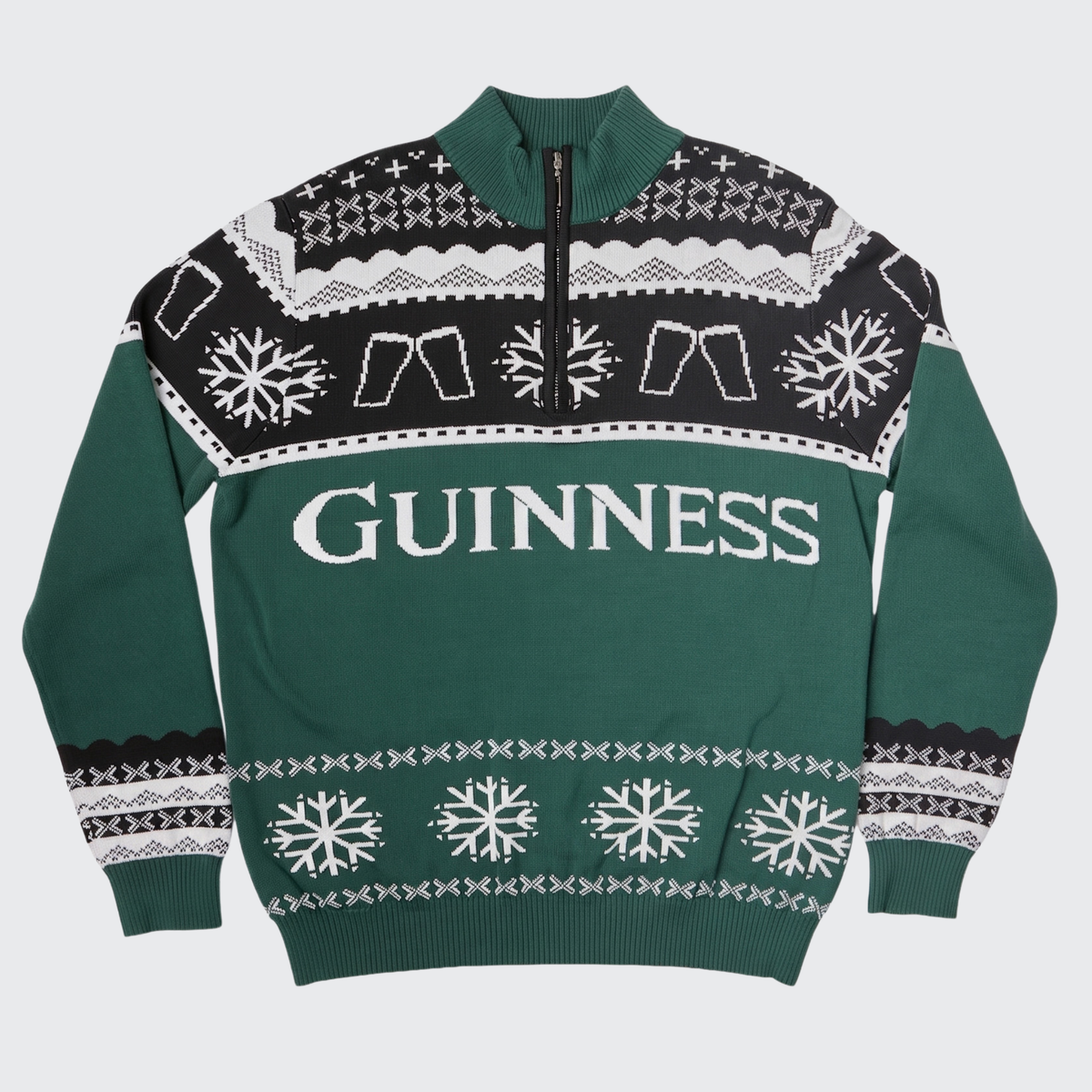 The Guinness Holiday Quarter Zip Sweater – Green & Black by Guinness showcases festive “GUINNESS” lettering, snowflake designs, pint glass motifs, and a comfortable quarter-zip collar—making it the ideal knitwear choice for holiday celebrations in style.