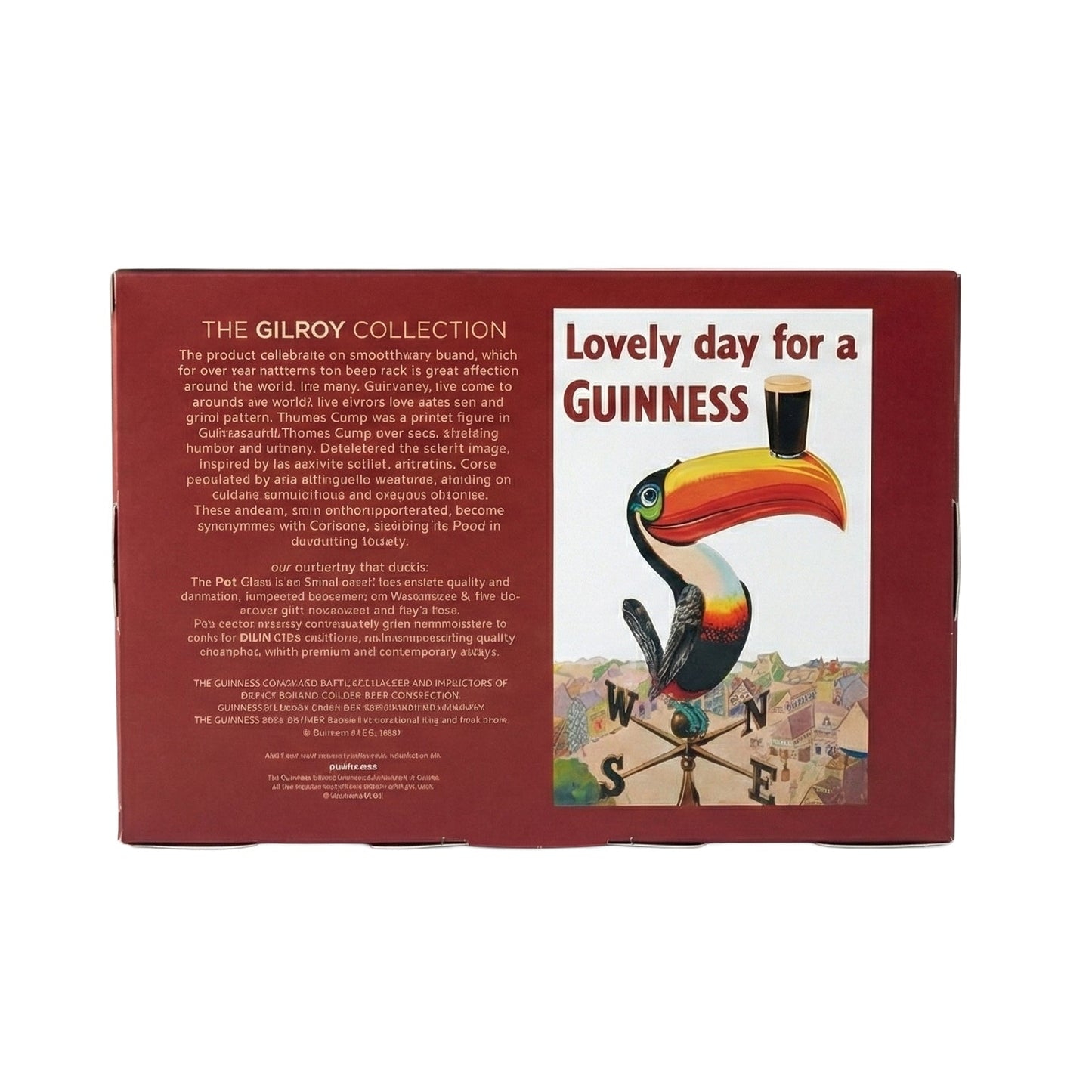 The Guinness Gilroy Toucan & Tortoise Pint Glass Set by Guinness Webstore US comes in a rectangular red box featuring "Lovely day for a Guinness," with a Flying Toucan balancing a pint on its beak and The Gilroy Collection details on the side.