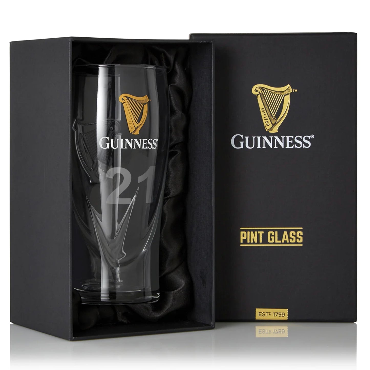A Guinness Pint Glass with the Harp logo, neatly packaged in a box.