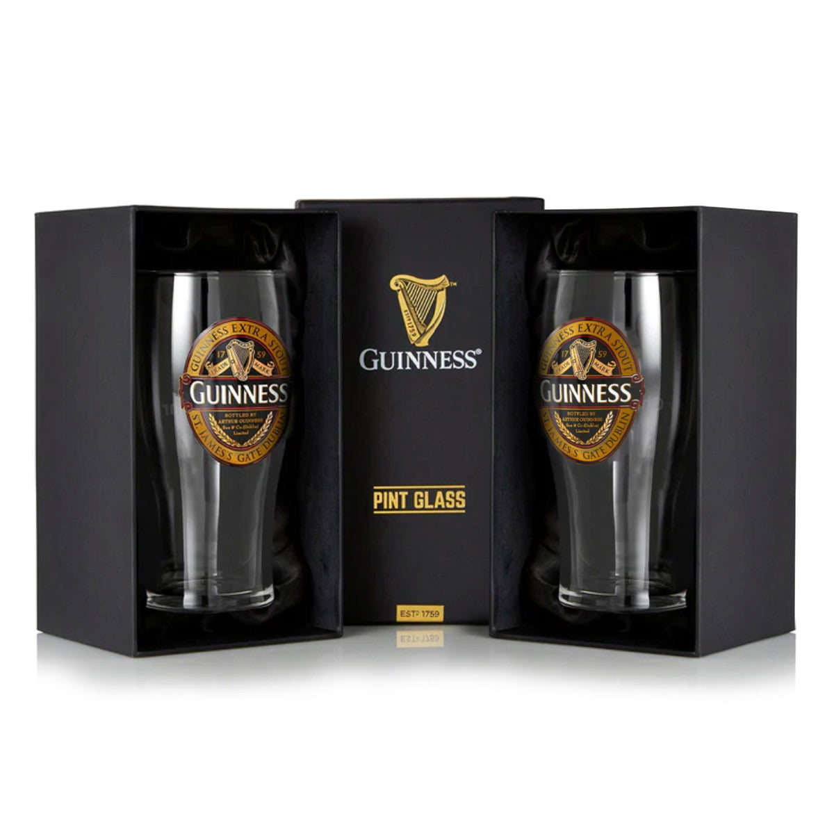 The Guinness Classic Pint Glass Twin Pack offers two pint glasses in black boxes with gold logos and the iconic Extra Stout label, flanking a central box labeled "Guinness Pint Glass," delivering an elegant and sophisticated set from the Guinness brand.