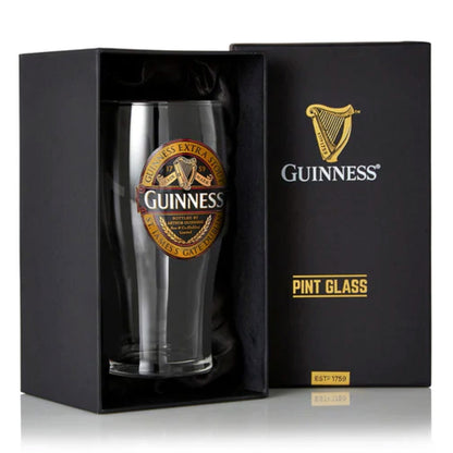 The Guinness Classic Pint Glass comes in a sleek black box with gold and white text and logo. It features the iconic Extra Stout Label, making it a must-have for collectors.