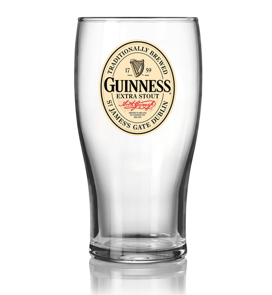 A clear, empty Guinness Vintage Label Pint Glass featuring a logo on the front, available from Guinness Webstore US.
