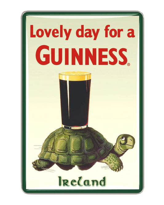 Featuring a whimsical tortoise illustration carrying a pint of Guinness on its shell, this sign displays the phrase "Lovely day for a Guinness - Ireland." Celebrate Irish tradition with the Guinness US: Guinness Metal Sign – Tortoise, an ideal addition to any collection.