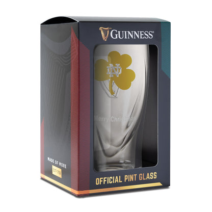 The special Guinness Shamrock 16oz Pint Glass by Notre Dame is elegantly packaged, showcasing the famous logo and festive "Merry Christmas" message.