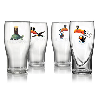 The Guinness Party Pack — 4 Pint Glass Bundle from Guinness Webstore US includes four clear collector’s pint glasses, each featuring vibrant animal illustrations—such as toucans with pints and a turtle—set against a crisp white background.