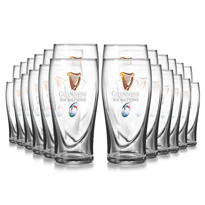 A 24-pack of clear Guinness Six Nations pint glasses from Guinness Webstore US, arranged in four staggered rows on a white background—ideal for any rugby enthusiast.