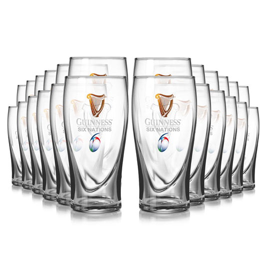 A 24-pack of clear Guinness Six Nations pint glasses from Guinness Webstore US, arranged in four staggered rows on a white background—ideal for any rugby enthusiast.