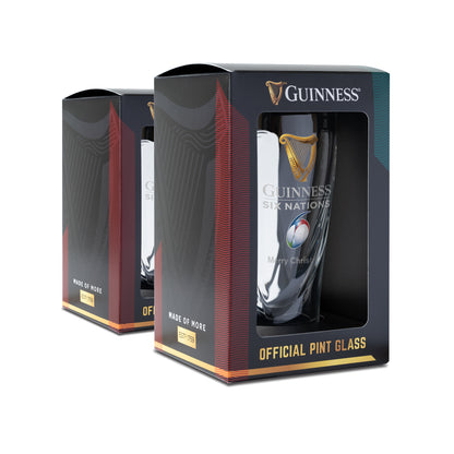 The Guinness Six Nations Pint Glass - 2 Pack from Guinness Webstore US features two official logo glasses in sleek black window packaging—ideal for enhancing your rugby viewing experience.