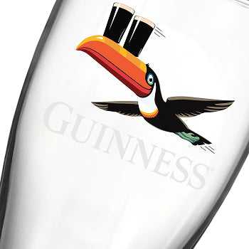 The Guinness Gilroy Christmas Glass Set from Guinness Webstore US features festive toucan glasses—perfect for holiday gifting!.