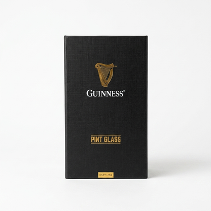 The Guinness Pint Glass Luxury Gift Box from Guinness Webstore US is a black rectangular gift box featuring the iconic Guinness harp logo, gold accents, and the text “Pint Glass” and “Est 1759” displayed on the front.