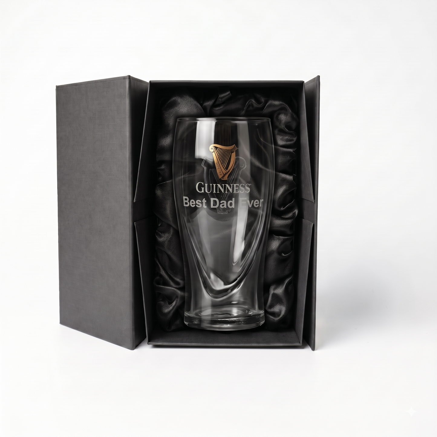 A clear Guinness Pint Glass from Guinness Webstore US, elegantly etched with “Guinness Best Dad Ever” and presented in a luxury gift box lined with black satin.