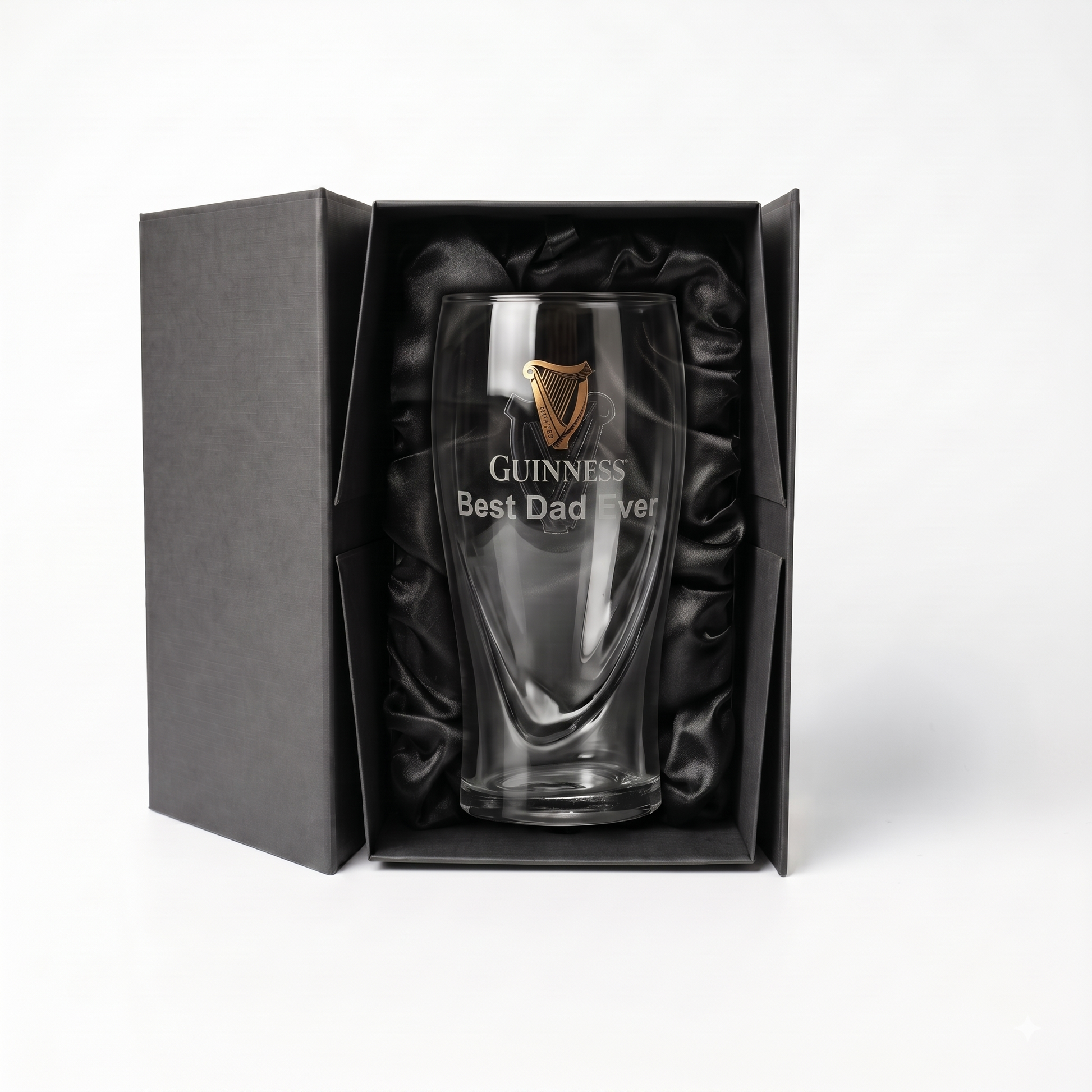 A clear Guinness Pint Glass from Guinness Webstore US, elegantly etched with “Guinness Best Dad Ever” and presented in a luxury gift box lined with black satin.